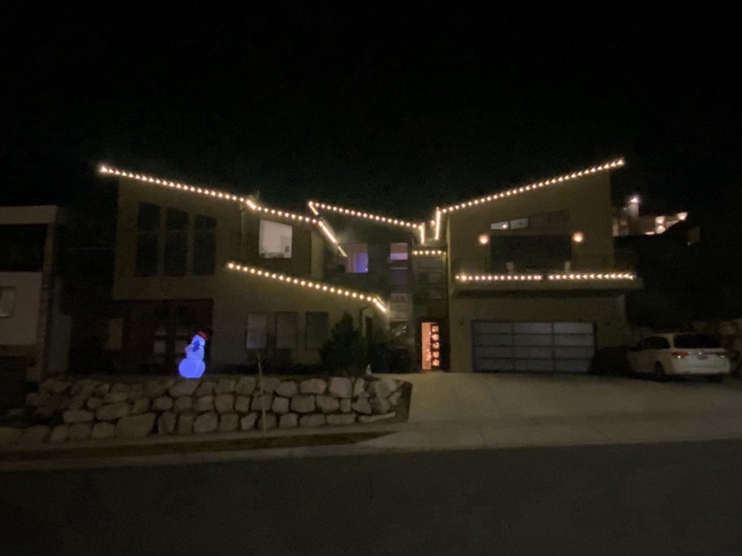 Warm white lights on a modern home