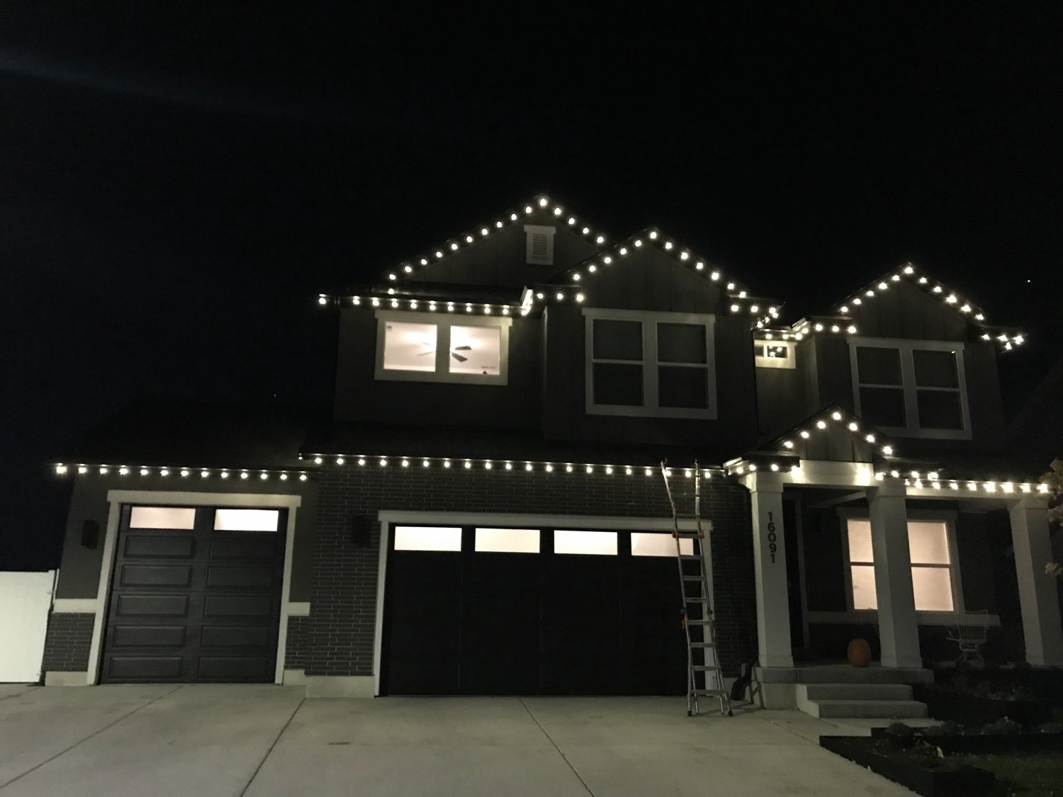 Warm white C9s on a two-story home